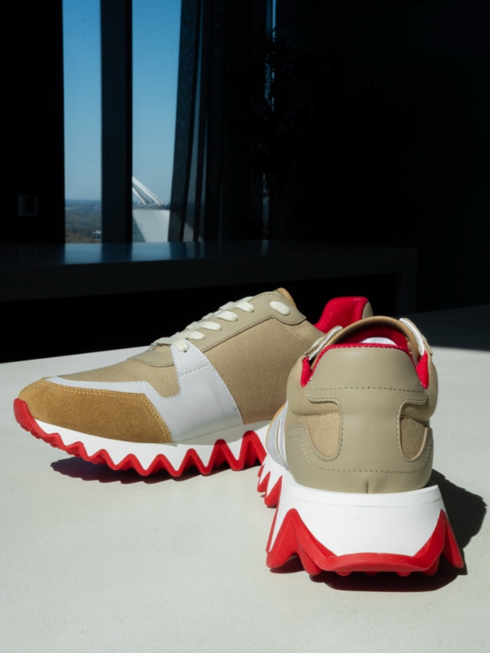 CHRISTIAN LOUBOUTIN
Nastroshark leather and canvas sneakers